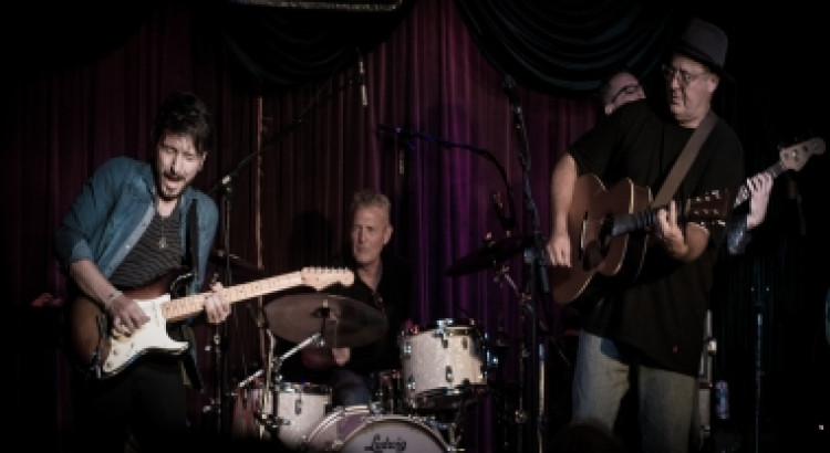 I will Professional electric/acoustic guitar tracks for your songs for $100